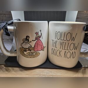 Rae Dunn Wizard of Oz "Follow the Yellow Brick Road" Mug w/ Dorothy/Glinda